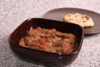 Salată de vinete cu roşii coapte şi ardei copţi