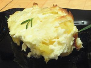 Cartofi cu brânză la cuptor